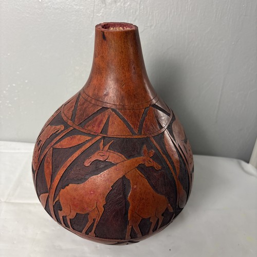 Hand carved gourd - hand, bottle