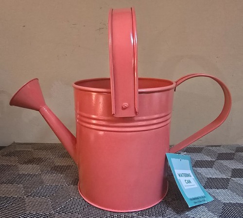 Orange metal watering - orange,