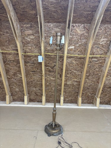 This antique brass - , lamp