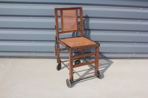 Antique wheelchair chair