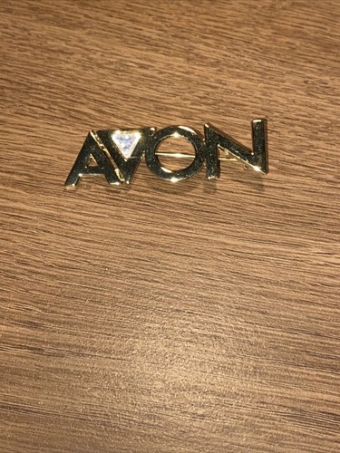 Gold tone avon pin - tone,