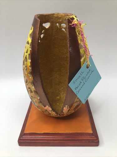 Hand carved orange gold - carved,