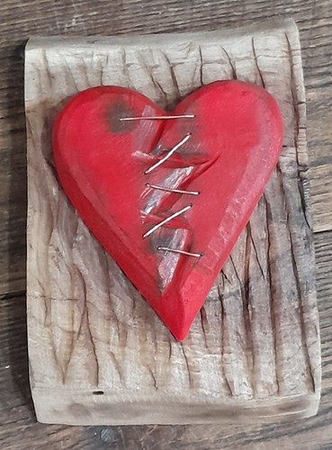 Chainsaw carved mended - carved, heart