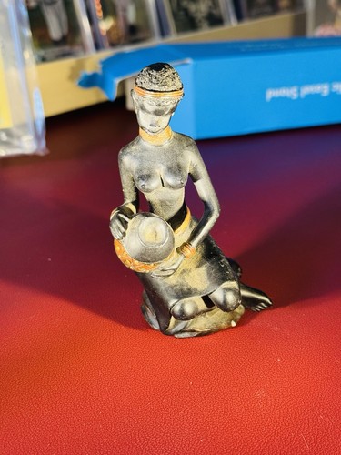 Female tribal figure with - figure,