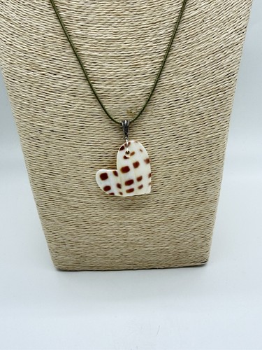 Hand carved authentic junonia - hand,