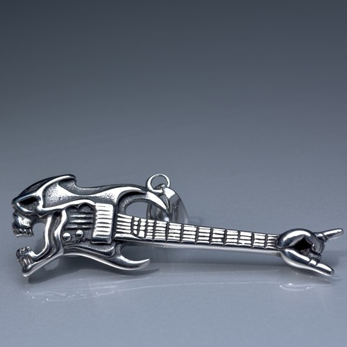 Silver electric bass guitar
