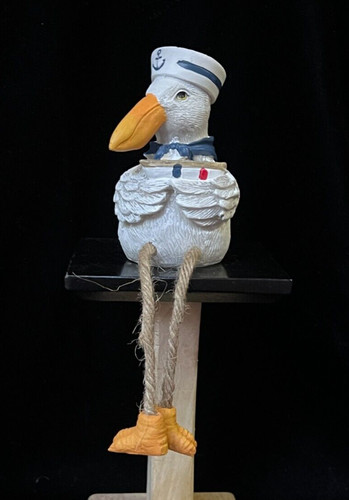 Pelican shelf sitter holding - sitter,