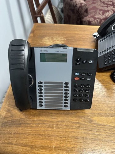Lightly used black - used, mitel