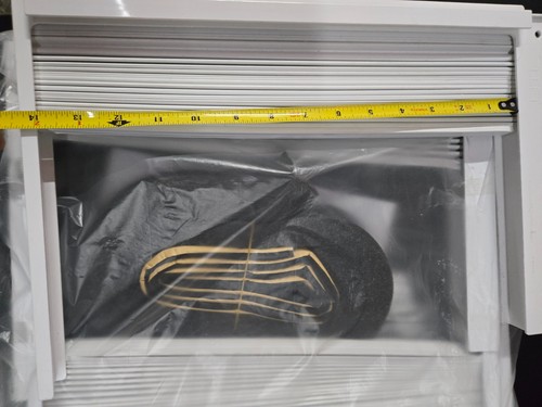 Window air conditioner - air, side