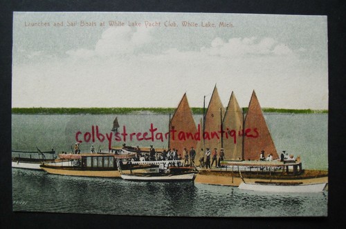 Launches sail boats at white - at,