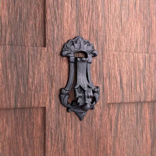 Black cast iron door knocker - cast,