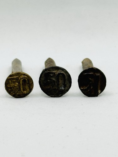 Vintage railroad date nails - date,