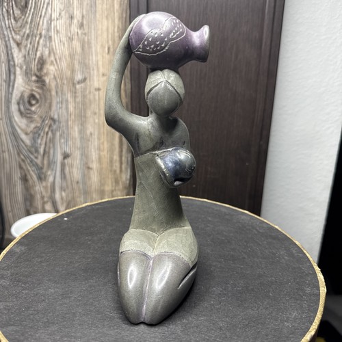 Hand carved volcanic - carved,