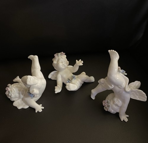 White porcelain cupid - porcelain,