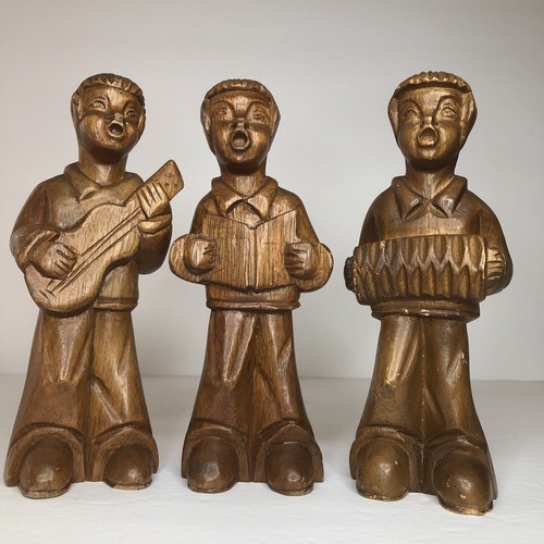 Carved wood choir singing - carved,