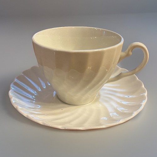 Cup and saucer - and,