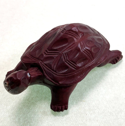Hand carved rosewood - hand,