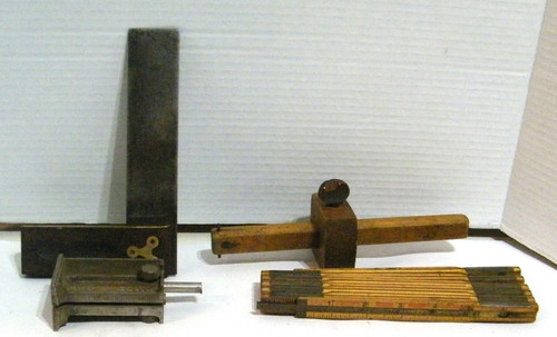 Vintage carpenters measuring - carpenters,