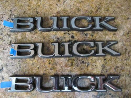 Buick plastic stick on - 3,
