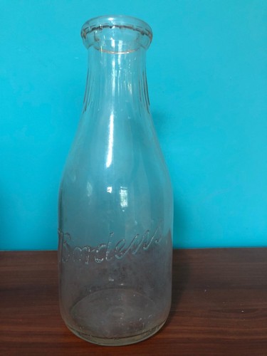 Vtg 1qt embossed milk - 1qt, bottle
