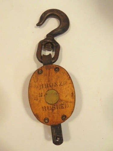 Older large wooden pulley - large,