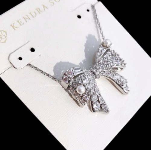 New krista silver bow short - new,