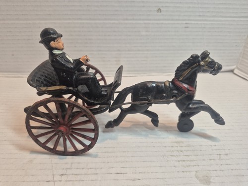 Antique cast iron horse drawn - cast,