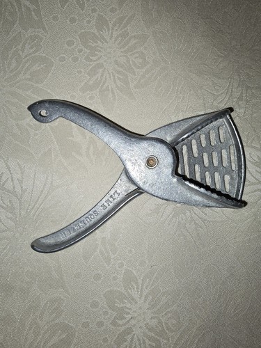 Vintage metal hand juicer - vintage,