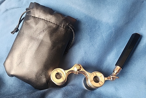 Black opera glasses with - opera,
