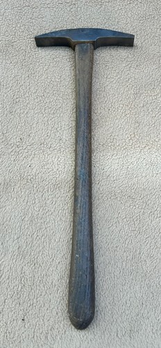Vintage stone mason chipping - stone,