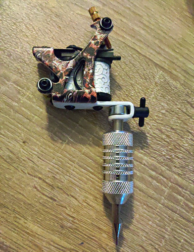Metal coil tattoo - metal, machine