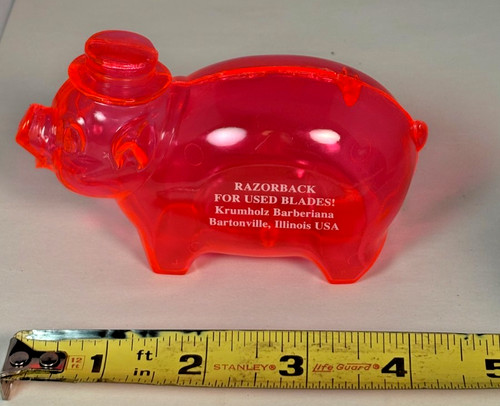 Fluorescent plastic pig - plastic, razor