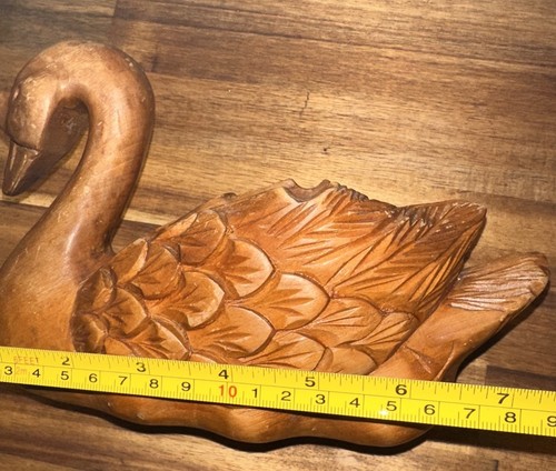 Hand carved wooden swan - hand,