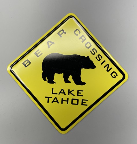 Black bear crossing - black, at