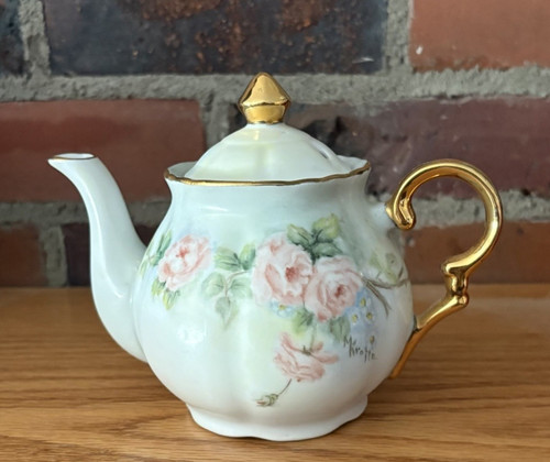 Vintage porcelain teapot