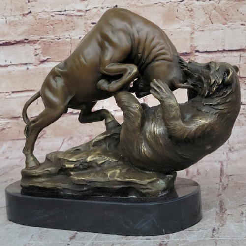 Bronze bull and - , bear