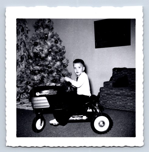 Vintage photograph boy rides - boy,