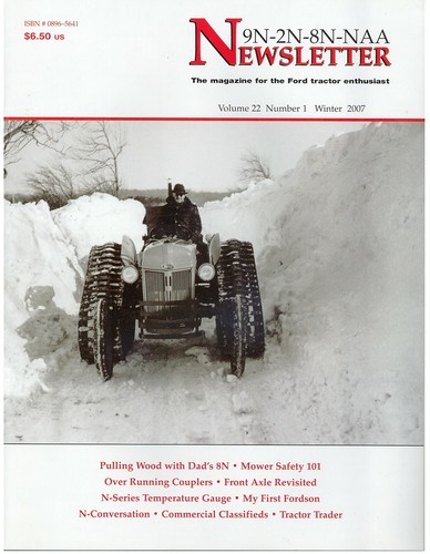 Ford pulling wood mower - pulling,