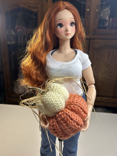 Hand crochet stacked pumpkins - hand,