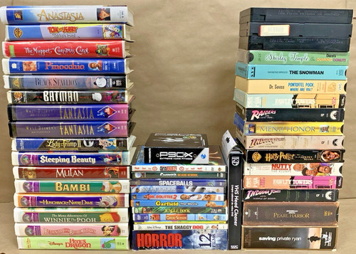 Vintage movie lot vhs - dvd, walt