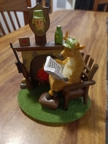 Buck deer reading paper - deer,