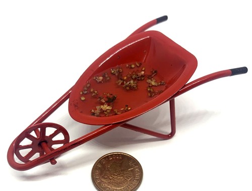 Rain filled metal wheel barrow - rain,