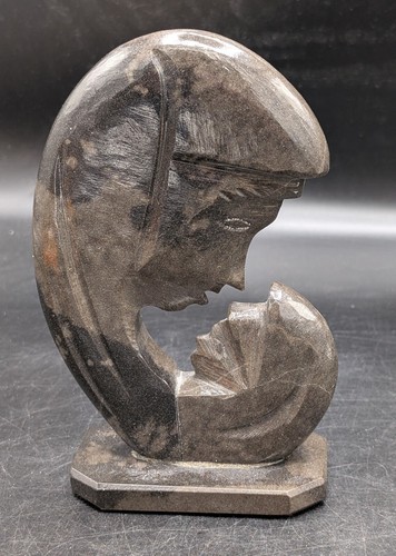 Stone sculpture mother - stone,