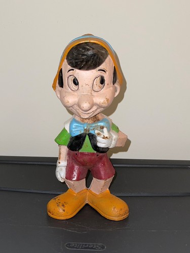 Cast iron pinocchio bank - cast,