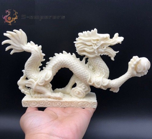 Chinese dragon holding pearl - holding, a