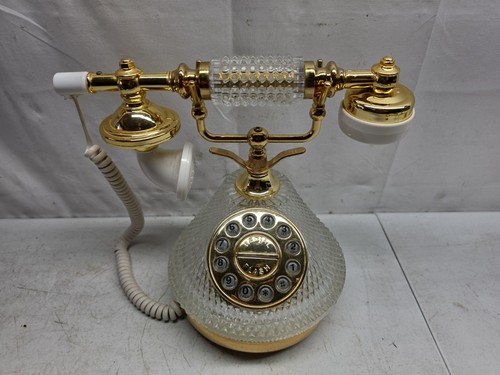 Gold tone crystal style rotary - tone,