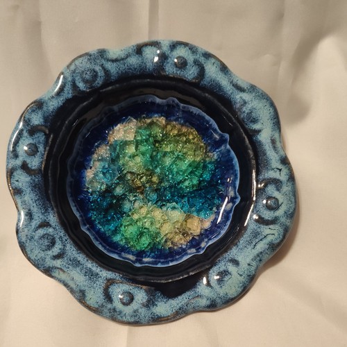 Down earth pottery - down, recycled