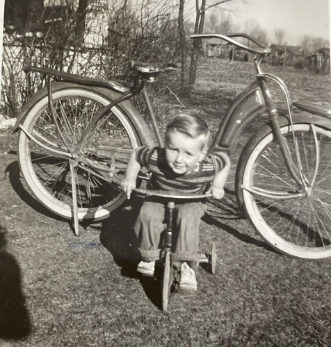 1950s young little boy riding - young,