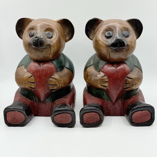 Pair wood carved teddy - of,