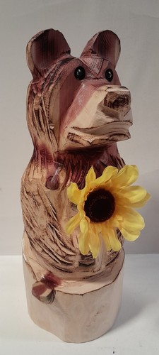 Chainsaw carved cedar flower - chainsaw,